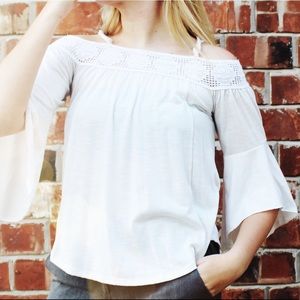 Detailed off the shoulder shirt